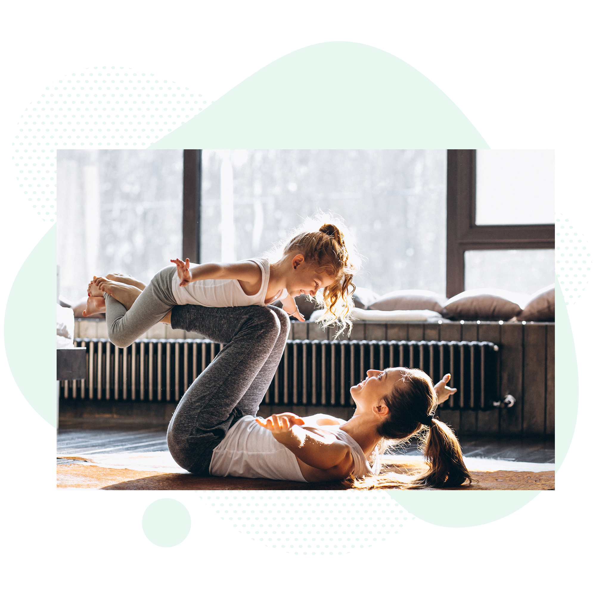 Mom and daughter doing yoga together